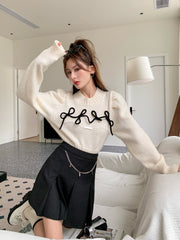 La Freedom Bow Tie Cropped Sweater